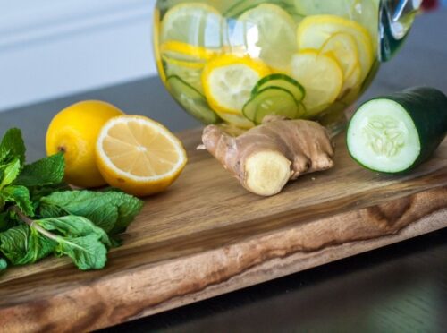 Cucumber Water pitcher with lemons, ginger, and mint leaves. Cucumber Water pitcher with lemons, ginger, and mint leaves.