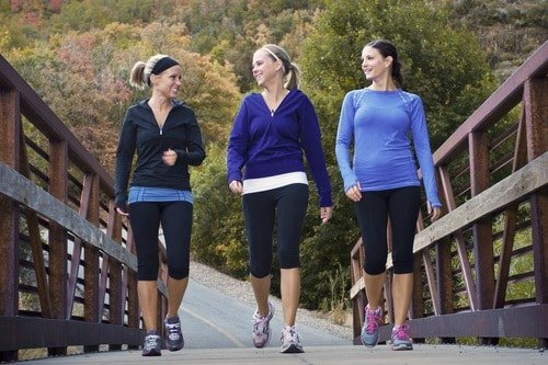 women walking together women walking together