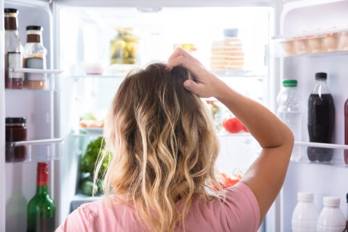 woman looking in fridge woman looking in fridge