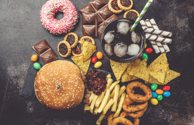 junk food, donut, burger, onion rings, candy, soda, etc.
