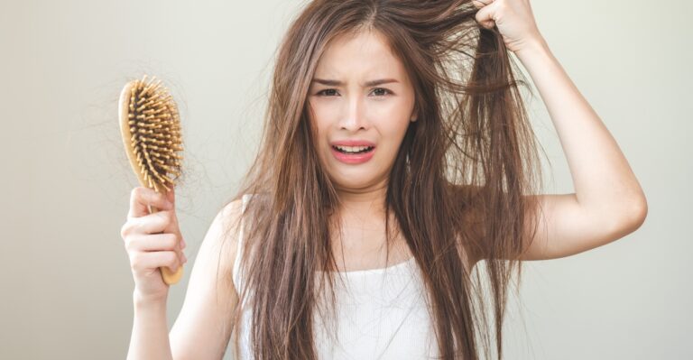 11 Simple Tricks to Tame Frizzy Hair